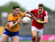18 May 2024; Brian McNamara of Clare in action against Ian Maguire of Cork during the GAA Football All-Ireland Senior Championship Round 1 match between Clare and Cork at Cusack Park in Ennis, Clare. Photo by Ray McManus/Sportsfile