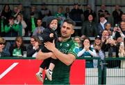 18 May 2024; Tiernan O’Halloran of Connacht with his 16 month old son Rían after the United Rugby Championship match between Connacht and DHL Stormers at The Sportsground in Galway. Photo by Michael P Ryan/Sportsfile