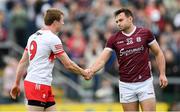18 May 2024; Cillian McDaid of Galway shakes hands with Brendan Rogers of Derry after the GAA Football All-Ireland Senior Championship Round 1 match between Galway and Derry at Pearse Stadium in Galway. Photo by Stephen McCarthy/Sportsfile