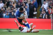18 May 2024; Charlie Ngatai of Leinster evades the tackle of Rob Herring of Ulster on his way to scoring his side's first try during the United Rugby Championship match between Ulster and Leinster at Kingspan Stadium in Belfast. Photo by Harry Murphy/Sportsfile