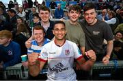 18 May 2024; Cormac Izuchukwu of Ulster celebrates with friends after the United Rugby Championship match between Ulster and Leinster at Kingspan Stadium in Belfast. Photo by Ramsey Cardy/Sportsfile