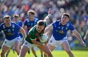 18 May 2024; Cillian O'Connor of Mayo in action against Niall Carolan of Cavan during the GAA Football All-Ireland Senior Championship Round 1 match between Mayo and Cavan at Hastings Insurance MacHale Park in Castlebar, Mayo. Photo by Stephen Marken/Sportsfile