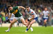 18 May 2024; Killian Lavelle of Monaghan in action against Paudie Clifford of Kerry during the GAA Football All-Ireland Senior Championship Round 1 match between Kerry and Monaghan at Fitzgerald Stadium in Killarney, Kerry. Photo by Brendan Moran/Sportsfile