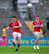 18 May 2024; Chris Óg Jones of Cork, left, during the GAA Football All-Ireland Senior Championship Round 1 match between Clare and Cork at Cusack Park in Ennis, Clare. Photo by Ray McManus/Sportsfile