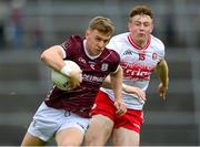18 May 2024; Dylan McHugh of Galway in action against Lachlan Murray of Derry during the GAA Football All-Ireland Senior Championship Round 1 match between Galway and Derry at Pearse Stadium in Galway. Photo by Stephen McCarthy/Sportsfile