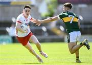 19 May 2024; Eoin McElholm of Tyrone in action against Cian Lynch of Kerry during the EirGrid GAA Football All-Ireland U20 Championship final match between Kerry and Tyrone at Laois Hire O’Moore Park in Portlaoise, Laois. Photo by Harry Murphy/Sportsfile
