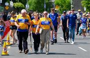 19 May 2024; Clare and Waterford supporters arrive for the Munster GAA Hurling Senior Championship Round 4 match between Clare and Waterford at Cusack Park in Ennis, Clare. Photo by Ray McManus/Sportsfile