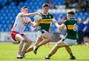 19 May 2024; Eoin McElholm of Tyrone in action against Cian Lynch and Darragh O'Connor of Kerry during the EirGrid GAA Football All-Ireland U20 Championship final match between Kerry and Tyrone at Laois Hire O’Moore Park in Portlaoise, Laois. Photo by Harry Murphy/Sportsfile