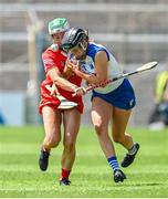 19 May 2024; Keeley Corbett Barry of Waterford in action against Laura Hayes of Cork during the Munster Senior Camogie Championship final match between Cork and Waterford at FBD Semple Stadium in Thurles, Tipperary. Photo by Brendan Moran/Sportsfile