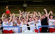 19 May 2024; Tyrone captain Michael Rafferty lifts the cup alongside teammates after his side's victory in the EirGrid GAA Football All-Ireland U20 Championship final match between Kerry and Tyrone at Laois Hire O’Moore Park in Portlaoise, Laois. Photo by Harry Murphy/Sportsfile