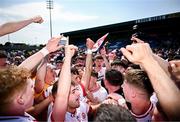 19 May 2024; Tyrone players after their side's victory in the EirGrid GAA Football All-Ireland U20 Championship final match between Kerry and Tyrone at Laois Hire O’Moore Park in Portlaoise, Laois. Photo by Harry Murphy/Sportsfile