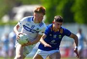 19 May 2024; Rioghan Murphy of Laois in action against Darragh Fee of Wicklow during the Tailteann Cup Round 2 match between Wicklow and Laois at Echelon Park in Aughrim, Wicklow. Photo by Stephen Marken/Sportsfile