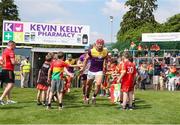 19 May 2024; Lee Chin of Wexford leads his team onto the pitch before the Leinster GAA Hurling Senior Championship Round 4 match between Carlow and Wexford at Netwatch Cullen Park in Carlow. Photo by Michael P Ryan/Sportsfile