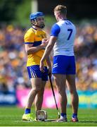 19 May 2024; Shane O'Donnell of Clare and Calum Lyons of Waterford after the Munster GAA Hurling Senior Championship Round 4 match between Clare and Waterford at Cusack Park in Ennis, Clare. Photo by John Sheridan/Sportsfile