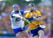 19 May 2024; Tony Kelly of Clare in action against Kieran Bennett of Waterford during the Munster GAA Hurling Senior Championship Round 4 match between Clare and Waterford at Cusack Park in Ennis, Clare. Photo by John Sheridan/Sportsfile