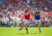 19 May 2024; Alan Connolly of Cork is tackled by Conor Bowe of Tipperary during the Munster GAA Hurling Senior Championship Round 4 match between Tipperary and Cork at FBD Semple Stadium in Thurles, Tipperary. Photo by Brendan Moran/Sportsfile