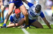 19 May 2024; Waterford players, Tadhg de Burca, centre, and Mark Fitzgerald watch the ball go out which ends up being a late 65 during the Munster GAA Hurling Senior Championship Round 4 match between Clare and Waterford at Cusack Park in Ennis, Clare. Photo by John Sheridan/Sportsfile