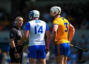 19 May 2024; Referee Liam Gordon speaks to Stephen Bennett of Waterford and Conor Cleary of Clare during the Munster GAA Hurling Senior Championship Round 4 match between Clare and Waterford at Cusack Park in Ennis, Clare. Photo by Ray McManus/Sportsfile