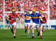 19 May 2024; Jake Morris of Tipperary in action against Niall O'Leary of Cork during the Munster GAA Hurling Senior Championship Round 4 match between Tipperary and Cork at FBD Semple Stadium in Thurles, Tipperary. Photo by Daire Brennan/Sportsfile