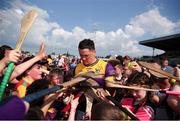 19 May 2024; Lee Chin of Wexford signs autographs for supporters after the Leinster GAA Hurling Senior Championship Round 4 match between Carlow and Wexford at Netwatch Cullen Park in Carlow. Photo by Michael P Ryan/Sportsfile