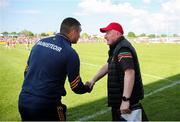 19 May 2024; Wexford manager Keith Rossiter, left, shakes hands with Carlow manager Tom Mullally after the Leinster GAA Hurling Senior Championship Round 4 match between Carlow and Wexford at Netwatch Cullen Park in Carlow. Photo by Michael P Ryan/Sportsfile