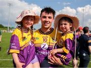 19 May 2024; Richie Lawlor of Wexford with his niece's Eille and Mia after the Leinster GAA Hurling Senior Championship Round 4 match between Carlow and Wexford at Netwatch Cullen Park in Carlow. Photo by Michael P Ryan/Sportsfile