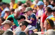 19 May 2024; A young Wexford supporter looks on during the Leinster GAA Hurling Senior Championship Round 4 match between Carlow and Wexford at Netwatch Cullen Park in Carlow. Photo by Michael P Ryan/Sportsfile