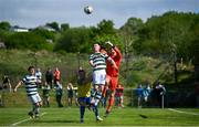 19 May 2024; Ayrfield United goalkeeper Shane O'Rourke in action against Luke Rudden of Cockhill Celtic during the Sports Direct Men’s FAI Cup First Round match between Cockhill Celtic and Ayrfield United at Charlie O'Donnell Sports Grounds in Buncrana, Donegal. Photo by Ramsey Cardy/Sportsfile
