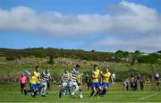 19 May 2024; Luke Rudden of Cockhill Celtic in action against Daniel Hickey of Ayrfield United during the Sports Direct Men’s FAI Cup First Round match between Cockhill Celtic and Ayrfield United at Charlie O'Donnell Sports Grounds in Buncrana, Donegal. Photo by Ramsey Cardy/Sportsfile
