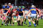 19 May 2024; Darragh Stakelum of Tipperary in action against Mark Coleman of Cork during the Munster GAA Hurling Senior Championship Round 4 match between Tipperary and Cork at FBD Semple Stadium in Thurles, Tipperary. Photo by Daire Brennan/Sportsfile