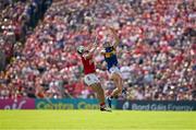 19 May 2024; Conor Bowe of Tipperary catches the sliotar ahead of Shane Kingston of Cork during the Munster GAA Hurling Senior Championship Round 4 match between Tipperary and Cork at FBD Semple Stadium in Thurles, Tipperary. Photo by Brendan Moran/Sportsfile