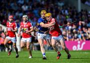 19 May 2024; Niall O'Leary of Cork in action against Jake Morris of Tipperary during the Munster GAA Hurling Senior Championship Round 4 match between Tipperary and Cork at FBD Semple Stadium in Thurles, Tipperary. Photo by Daire Brennan/Sportsfile