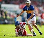 19 May 2024; Cork goalkeeper Patrick Collins is tackled by Patrick Maher of Tipperary during the Munster GAA Hurling Senior Championship Round 4 match between Tipperary and Cork at FBD Semple Stadium in Thurles, Tipperary. Photo by Brendan Moran/Sportsfile