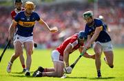 19 May 2024; Sean O'Donoghue of Cork and Darragh Stakelum of Tipperary contest a loose ball during the Munster GAA Hurling Senior Championship Round 4 match between Tipperary and Cork at FBD Semple Stadium in Thurles, Tipperary. Photo by Brendan Moran/Sportsfile