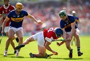 19 May 2024; Sean O'Donoghue of Cork and Darragh Stakelum of Tipperary contest a loose ball during the Munster GAA Hurling Senior Championship Round 4 match between Tipperary and Cork at FBD Semple Stadium in Thurles, Tipperary. Photo by Brendan Moran/Sportsfile