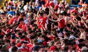 19 May 2024; Cork supporters celebrate on the field after the Munster GAA Hurling Senior Championship Round 4 match between Tipperary and Cork at FBD Semple Stadium in Thurles, Tipperary. Photo by Daire Brennan/Sportsfile