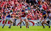 19 May 2024; Patrick Horgan of Cork is dispossessed by Conor Bowe and Craig Morgan of Tipperary during the Munster GAA Hurling Senior Championship Round 4 match between Tipperary and Cork at FBD Semple Stadium in Thurles, Tipperary. Photo by Brendan Moran/Sportsfile