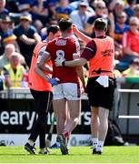 19 May 2024; Ethan Twomey of Cork leaves the pitch with a head injury during the Munster GAA Hurling Senior Championship Round 4 match between Tipperary and Cork at FBD Semple Stadium in Thurles, Tipperary. Photo by Brendan Moran/Sportsfile