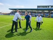 19 May 2024; Waterford manager Davy Fitzgerald shakes hands with umpires, from left, John Larkin, Alan McClearn, Damian Gibbons and Ollie Reilly before the Munster GAA Hurling Senior Championship Round 4 match between Clare and Waterford at Cusack Park in Ennis, Clare. Photo by Ray McManus/Sportsfile