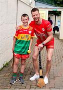 19 May 2024; Mascot Kyle Lillis with Jack Kavanagh of Carlow before the Leinster GAA Hurling Senior Championship Round 4 match between Carlow and Wexford at Netwatch Cullen Park in Carlow. Photo by Michael P Ryan/Sportsfile