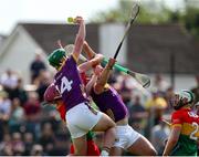 19 May 2024; Conor McDonald of Wexford in action against Dion Wall of Carlow during the Leinster GAA Hurling Senior Championship Round 4 match between Carlow and Wexford at Netwatch Cullen Park in Carlow. Photo by Michael P Ryan/Sportsfile