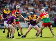 19 May 2024; Shane Reck of Wexford in action against Conor Kehoe of Carlow during the Leinster GAA Hurling Senior Championship Round 4 match between Carlow and Wexford at Netwatch Cullen Park in Carlow. Photo by Michael P Ryan/Sportsfile