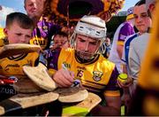 19 May 2024; Rory O'Connor of Wexford signs autographs for supporters after the Leinster GAA Hurling Senior Championship Round 4 match between Carlow and Wexford at Netwatch Cullen Park in Carlow. Photo by Michael P Ryan/Sportsfile