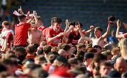 19 May 2024; Cork supporters celebrate after the Munster GAA Hurling Senior Championship Round 4 match between Tipperary and Cork at FBD Semple Stadium in Thurles, Tipperary. Photo by Brendan Moran/Sportsfile
