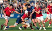 17 May 2024; Fineen Wycherley of Munster, centre, in action against Ewan Ashman of Edinburgh during the United Rugby Championship match between Edinburgh and Munster at the Hive Stadium in Edinburgh, Scotland. Photo by Mark Scates/Sportsfile
