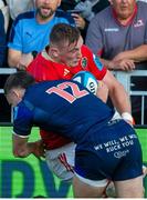 17 May 2024; Fineen Wycherley of Munster in action against James Lang of Edinburgh during the United Rugby Championship match between Edinburgh and Munster at the Hive Stadium in Edinburgh, Scotland. Photo by Mark Scates/Sportsfile
