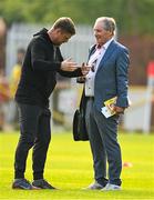 20 May 2024; Shelbourne manager Damien Duff, left, in conversation with his old manager and Virgin Media soccer analyst Brian Kerr before the SSE Airtricity Men's Premier Division match between St Patrick's Athletic and Shelbourne at Richmond Park in Dublin. Photo by Brendan Moran/Sportsfile
