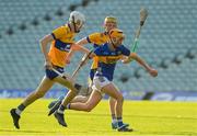 20 May 2024; Eoghan Doughan of Tipperary in action against Ryan Hayes and David Ryan of Clare during the Electric Ireland Munster GAA Hurling Minor Championship Final match between Clare and Tipperary at TUS Gaelic Grounds in Limerick. Photo by Matt Browne/Sportsfile