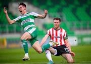 20 May 2024; Johnny Kenny of Shamrock Rovers is fouled by Cameron McJannet of Derry City, resulting in a Shamrock Rovers penalty, during the SSE Airtricity Men's Premier Division match between Shamrock Rovers and Derry City at Tallaght Stadium in Dublin. Photo by Ramsey Cardy/Sportsfile