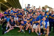 20 May 2024; Tipperary players celebrate with the John Doyle Cup after the Electric Ireland Munster GAA Hurling Minor Championship Final match between Clare and Tipperary at TUS Gaelic Grounds in Limerick. Photo by Matt Browne/Sportsfile